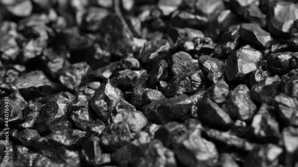Stone ore close-up. Black stones grunge background. Stone ore close-up. Black stones grunge background.