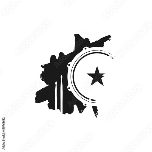 Vector logo of rock school or rock band. Snare drum with drumsticks and ink or paint drops and blots.