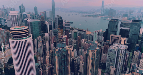 AERIAL. Hong Kong City skyline at sunrise. Hongkong skyscraper view from drone.