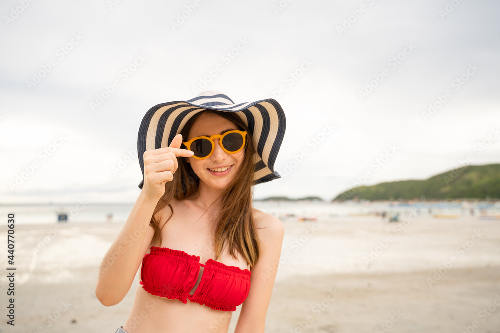 Portrait of a 20-30 year old woman walking traveling and play marine sports on a beach by the sea in Thailand.
Portrait of a 20-30 year old woman walking traveling and play marine sports on a beach by the sea in Thailand.