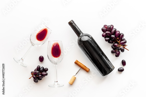Set of wine bottle with glasses corkscrew and grape
