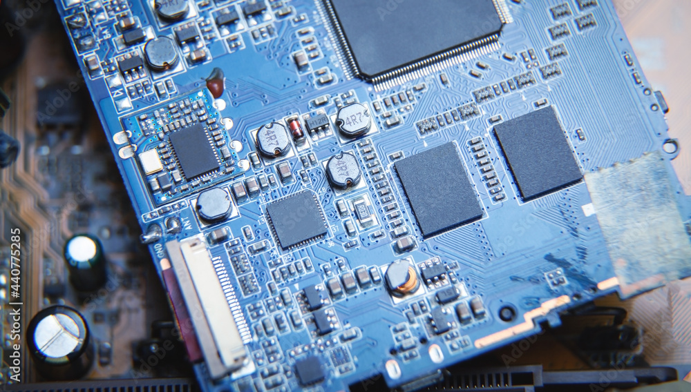 Fototapeta premium Macro view. Microchip in circuit board. Technology background