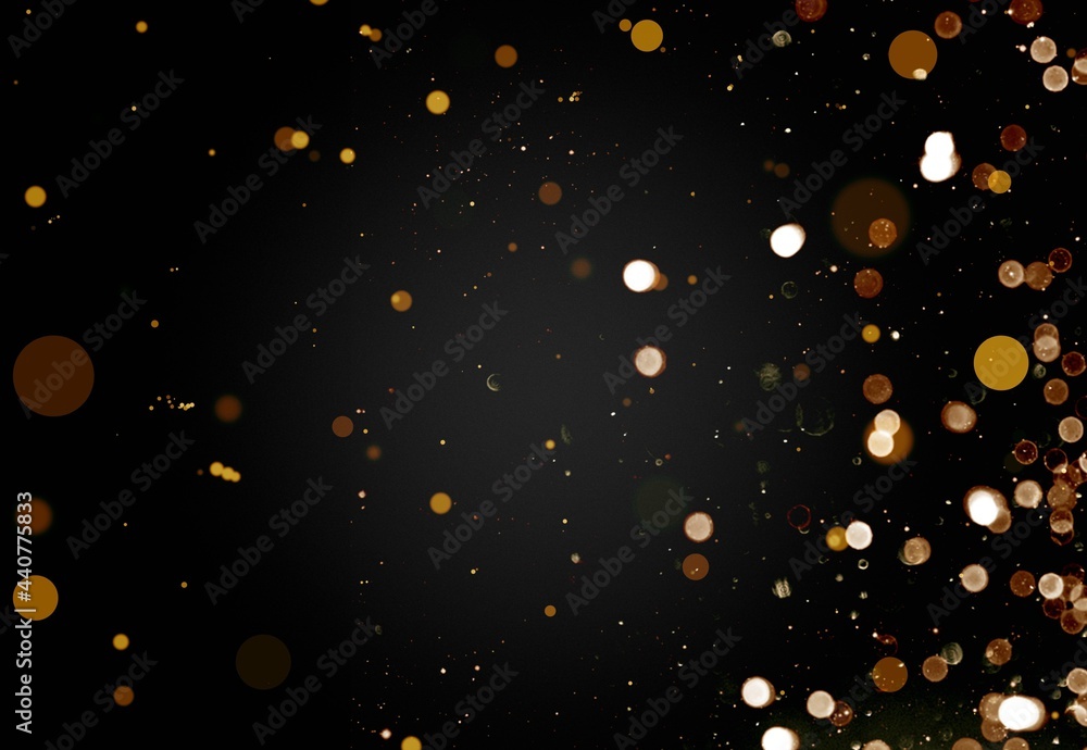 Glittering gold stars of bokeh use for celebrating on a dark background Glittering gold stars of bokeh use for celebrating on a dark background