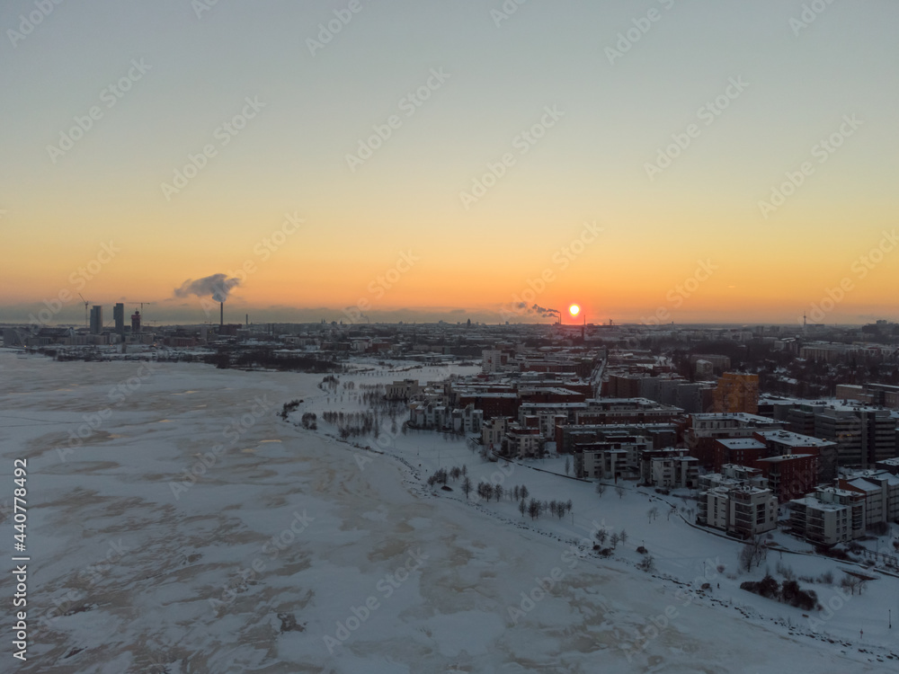 Nordic city at winter sunset