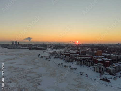Nordic city at winter sunset