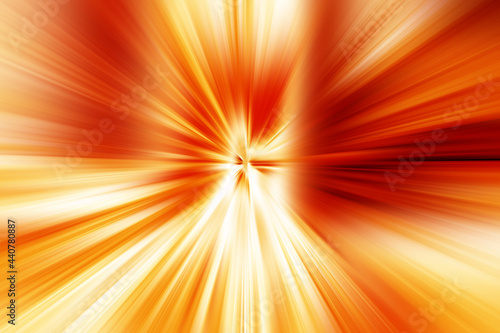Abstract surface blur of radial zoom in orange, yellow and white tones. Spectacular bright background with radial, diverging, converging lines.