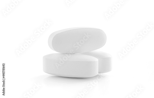 white supplement tablets for health isolated on white background