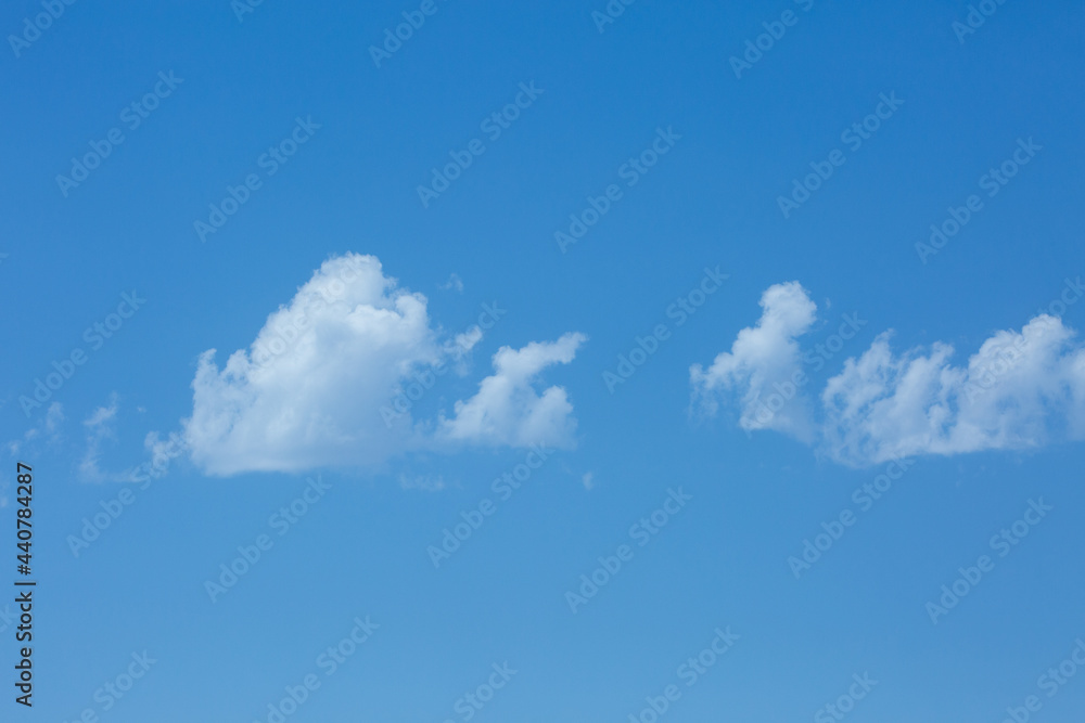 Selected Single Clouds with Bright Blue Sky Background Selected Single Clouds with Bright Blue Sky Background