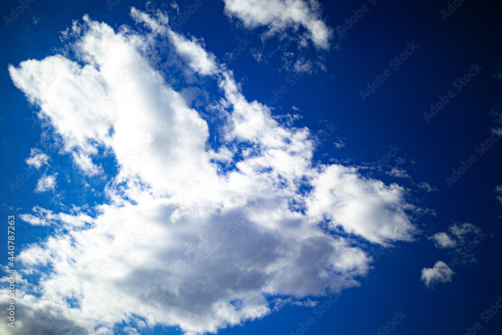 Fototapeta premium beautiful live white snowy fluffy clouds float over the city