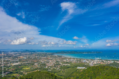aerial panorama view Chalong gulf in blue sea. Loan island is close to Chalong pier..Houses  buildings of Phuket Town.