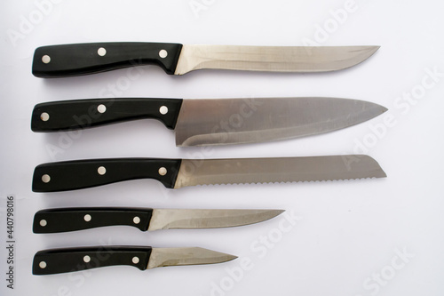 set of kitchen knives on the white background.