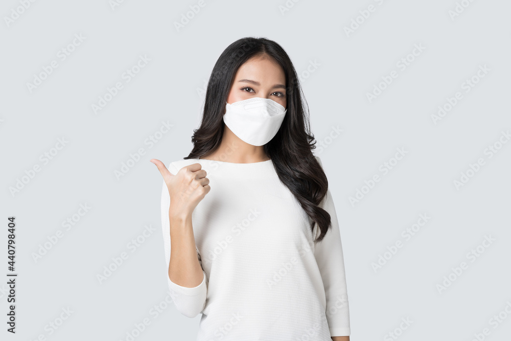 Young Asian woman wearing hygienic mask to prevent infection corona virus Air pollution pm2.5 in isolated on white background Young Asian woman wearing hygienic mask to prevent infection corona virus Air pollution pm2.5 in isolated on white background