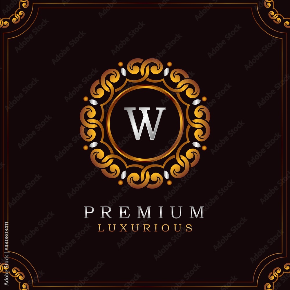 Fototapeta premium Golden Premium Luxury Mandala Badge Letter W Logo Design. Elegance Ornate Decoration Mandala Badge On Golden Frame .