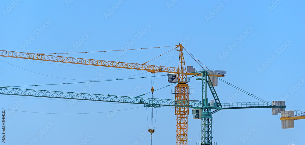 part of yellow construction crane part of yellow construction crane
