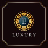 Luxury Mandala Badge E Letter Logo Design. Elegant Ornate Decoration Luxurious Logo Template.