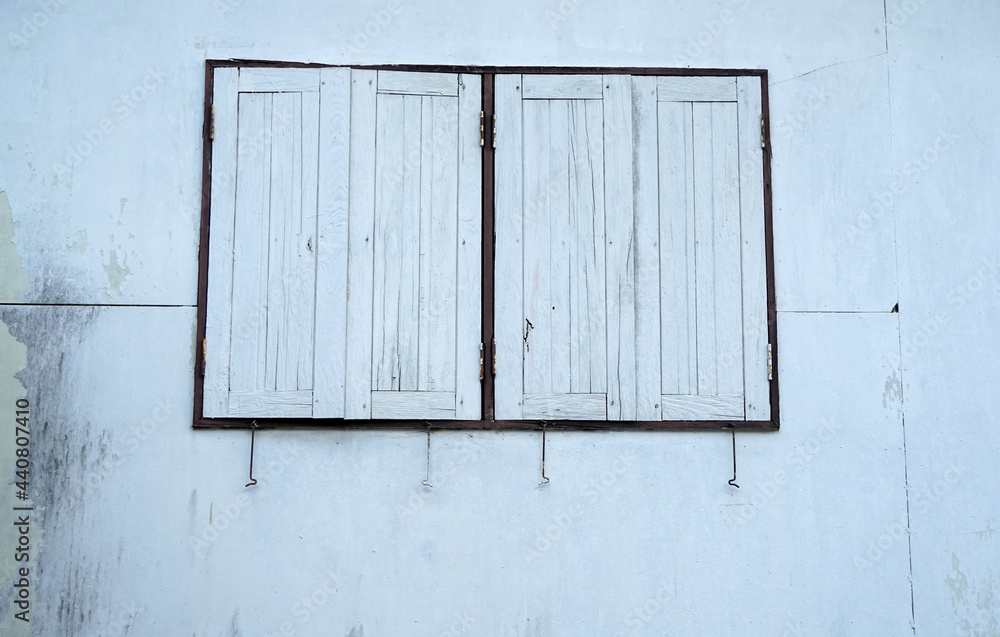 Window of an old white house in Thailand. Window of an old white house in Thailand.
