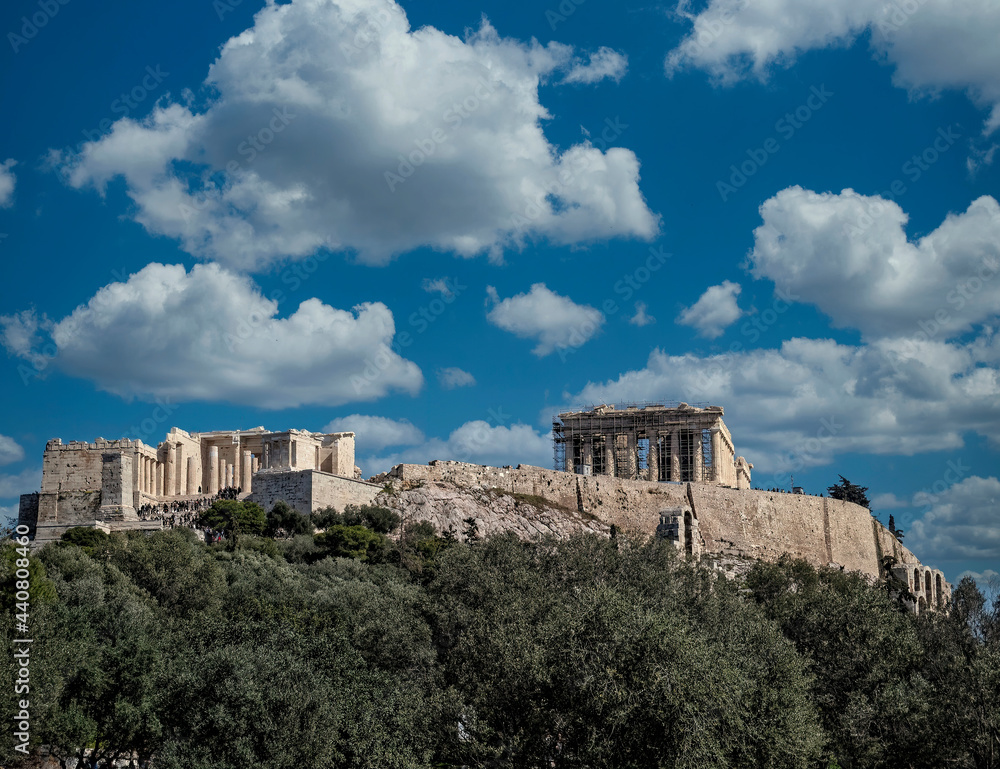 Parthenon on Acropolis of Athens Greece, under blue sky with some white clouds Parthenon on Acropolis of Athens Greece, under blue sky with some white clouds