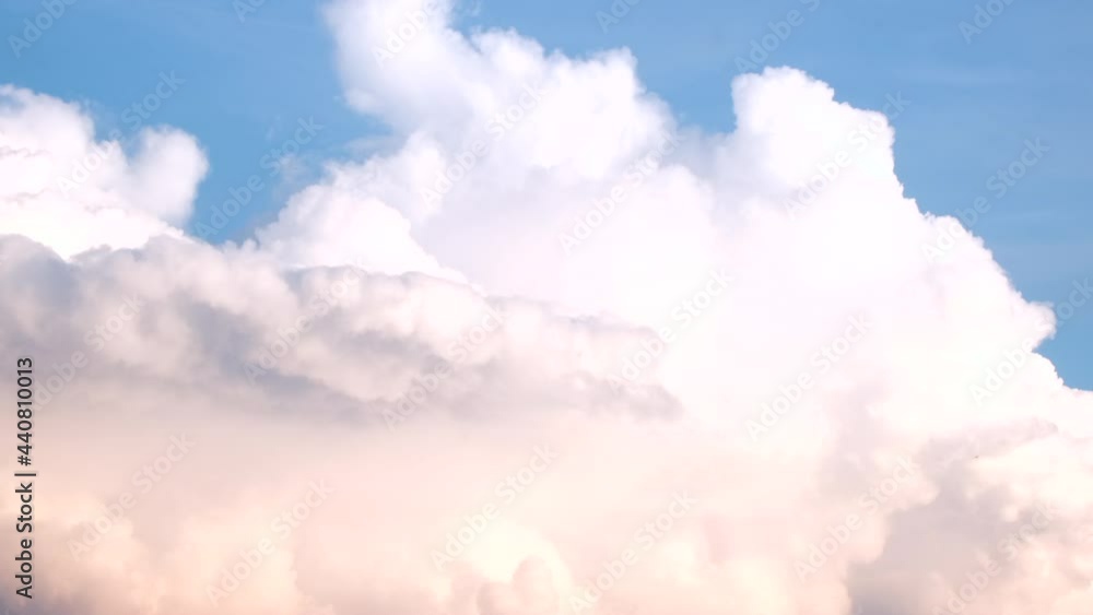 4K Sky Time lapse. Timelapse of white fluffy clouds moving on the clear blue sky. Summer sky time lapse in evening. Cumulus cloud cloudscape. Beautiful nature background 4K Sky Time lapse. Timelapse of white fluffy clouds moving on the clear blue sky. Summer sky time lapse in evening. Cumulus cloud cloudscape. Beautiful nature background