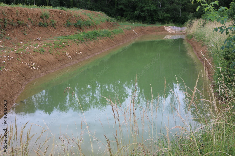Bassin de rétention des eaux pluviales Stock Photo Adobe Stock — free download