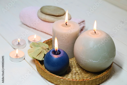 Candles, towel and stones