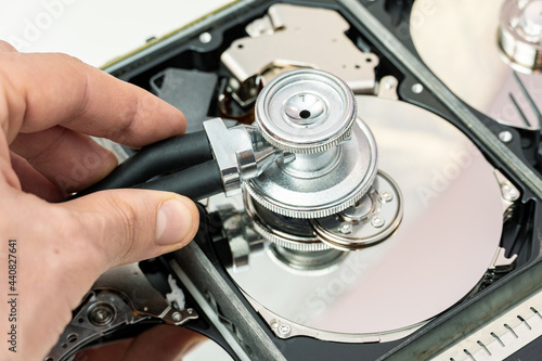 Wallpaper Mural hard drive diagnostics with a stethoscope. Recovery, search lost data, information in hdd repair service Torontodigital.ca