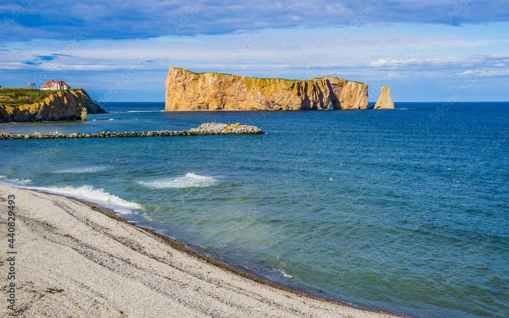 View on Percé rock and the Cape Mont Joli, the symbols of the Gaspesie region of Quebec (Canada)