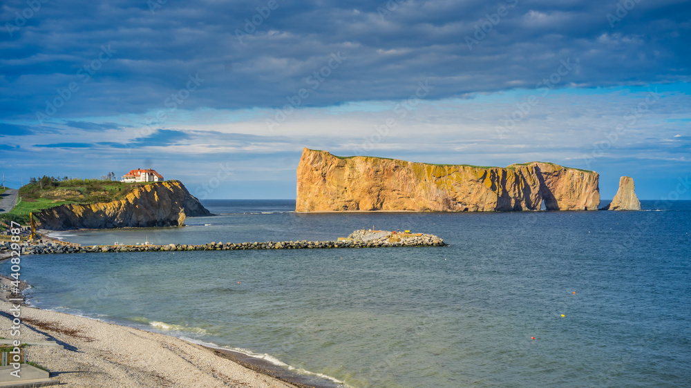 View on Percé rock and the Cape Mont Joli, the symbols of the Gaspesie region of Quebec (Canada)