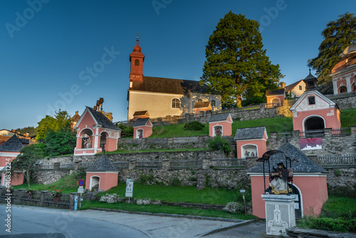 Kalvarienbergkirche church with many of chapels on small hill in summer morning