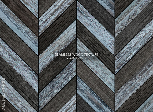 Seamless wooden background with chevron pattern. Old rustic black and blue parquet floor close up. Wood texture, EPS 10 vector.