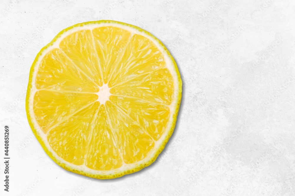Fresh ripe lemon slice on white background Fresh ripe lemon slice on white background