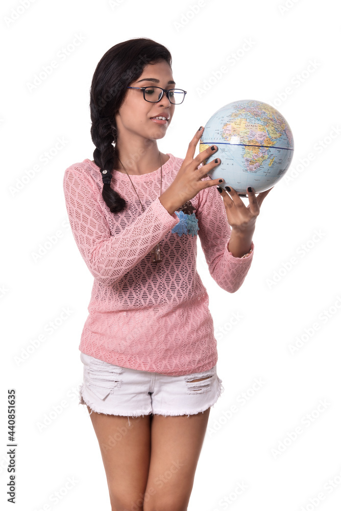 Beautiful Girl holding a world globe isolated on a white background Beautiful Girl holding a world globe isolated on a white background