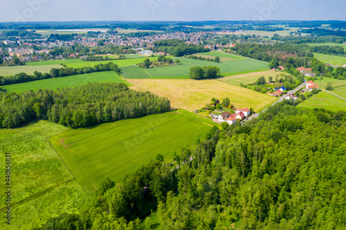 Aerial view from the drone of landscape of the German countryside. Agricultural fields  villages  and woodlands.