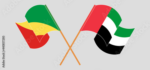 Crossed and waving flags of Republic of the Congo and the United Arab Emirates