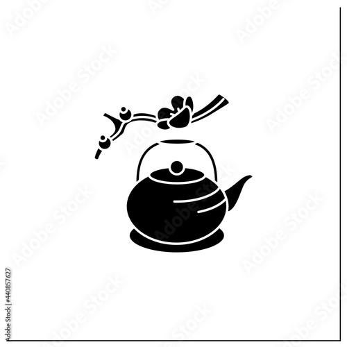 Japanese teapot glyph icon. Ancient kettle for tea ceremony and sakura twig. Trendy traditional teapot. Unique ritual. Tea ceremony concept.Filled flat sign. Isolated silhouette vector illustration