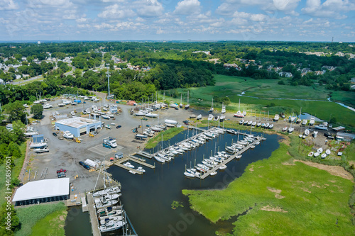 Panorama view the little port dock for boats on ocean marina near small american town © ungvar