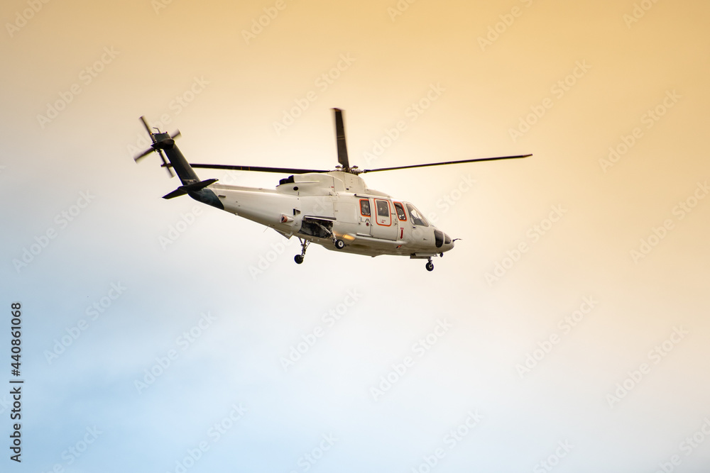 Helicopter flying in a beautiful sky Helicopter flying in a beautiful sky