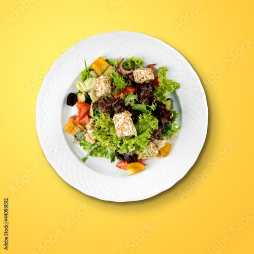 Classic tasty salad with fresh vegetables, cheese. Healthy food.