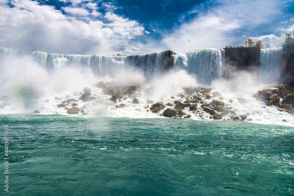 Niagara Falls.  Falling water crashes on stones