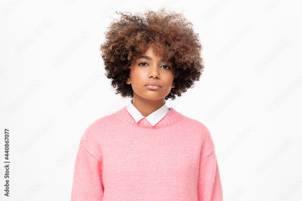 Unhappy african girl looking at camera with sad face and bad mood Unhappy african girl looking at camera with sad face and bad mood
