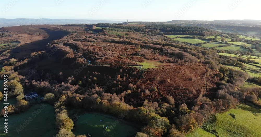 4K Aerial slow descent over the mountains and beautiful green rolling hills of Culmstock Beacon in the Blackdown Hills of Devon England 4K Aerial slow descent over the mountains and beautiful green rolling hills of Culmstock Beacon in the Blackdown Hills of Devon England