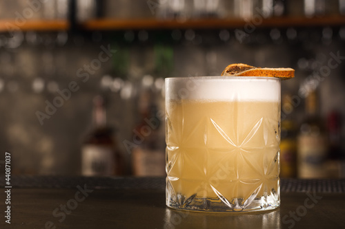 Whiskey Sour drink in a bar environment