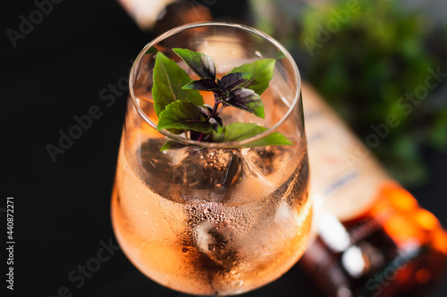 refreshing bar drink rosato mio made with ramazzotti, basil and ice