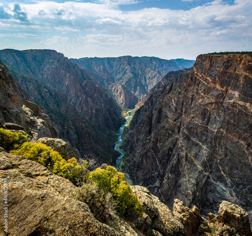 Standing at Cliff's Edge along the Cedar Point Trail