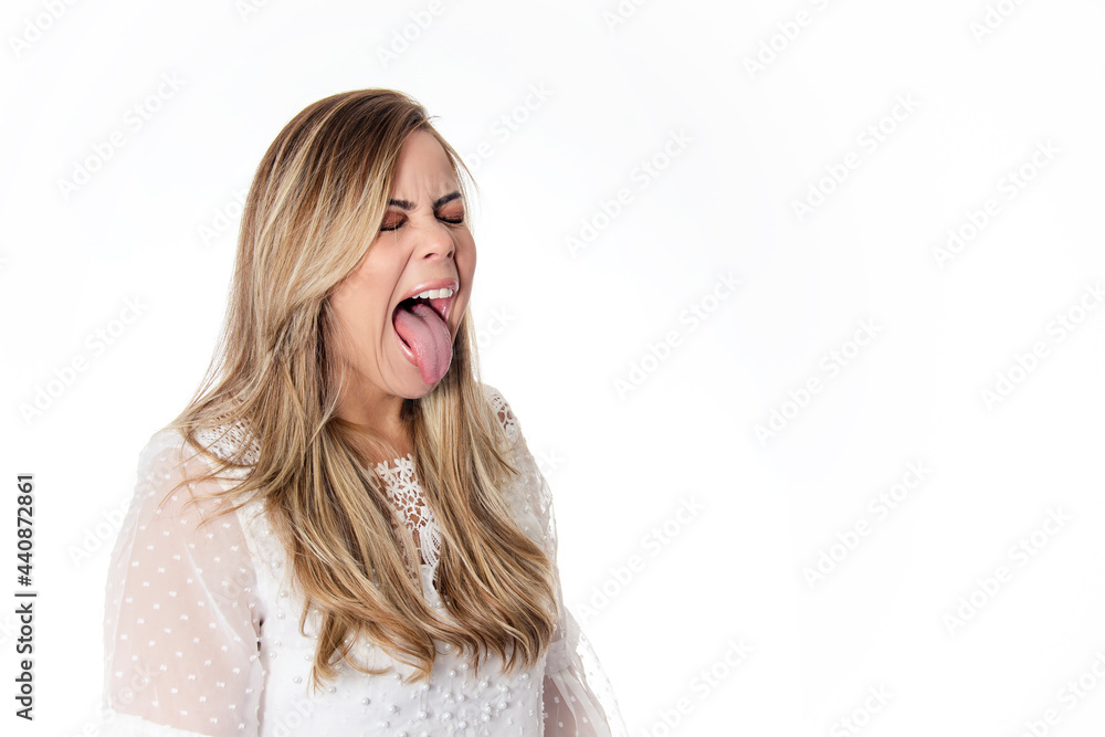 portrait of a woman showing tongue on white background portrait of a woman showing tongue on white background