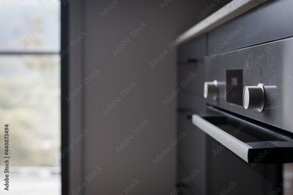 Electric oven with control knobs at home Electric oven with control knobs at home