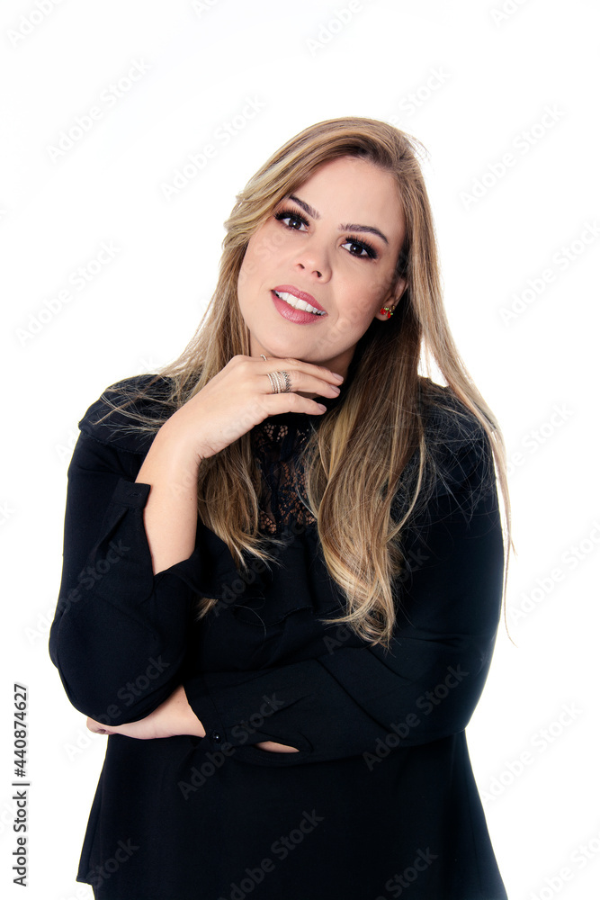 blonde woman wearing black outfit on white background with hando on chin blonde woman wearing black outfit on white background with hando on chin