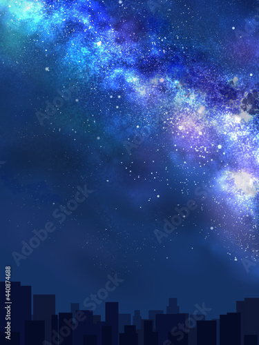天の川が流れる夜空と街並みのシルエット（タテ）