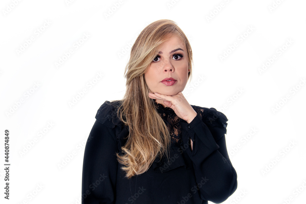 blonde serious woman wearing black outfit on white background blonde serious woman wearing black outfit on white background