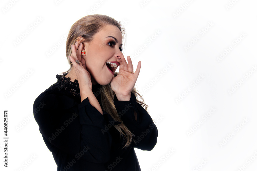 blonde woman telling secret wearing black outfit on white background blonde woman telling secret wearing black outfit on white background