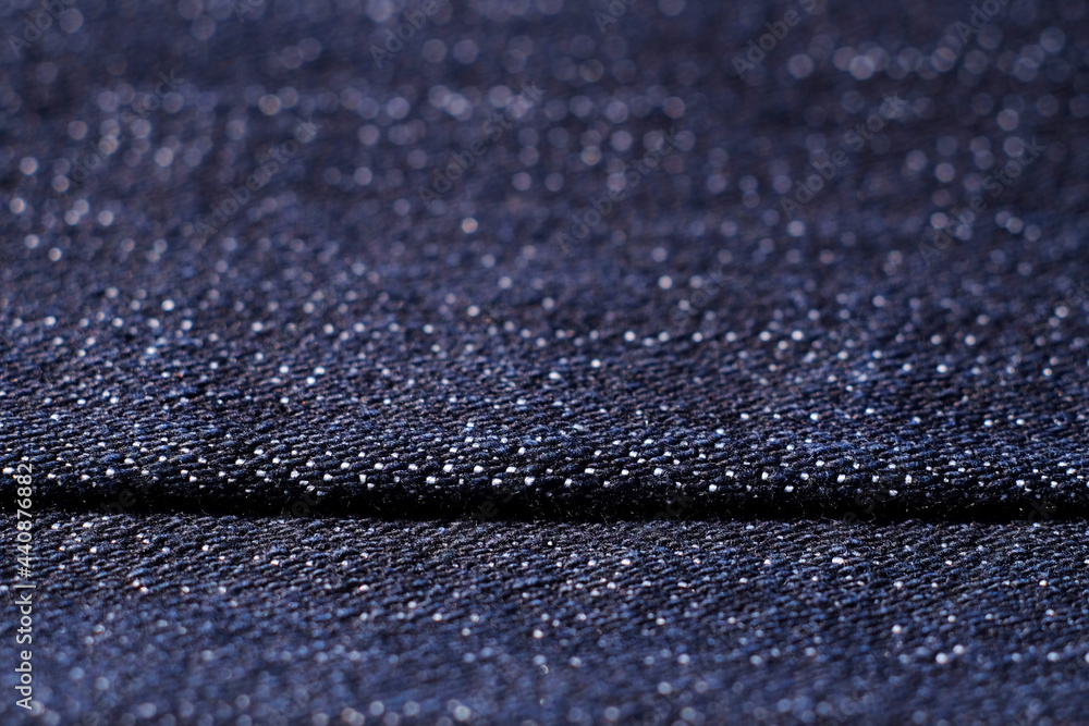 closeup dark blue jean texture